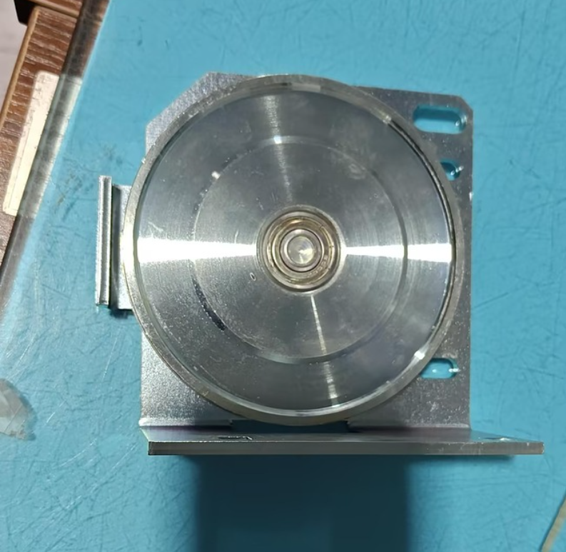 Отводной шкив тросика синхронизации дверей шахты AMD KM601200G02,KONE Отводной шкив тросика синхронизации дверей шахты AMD KM601200G02,KONE